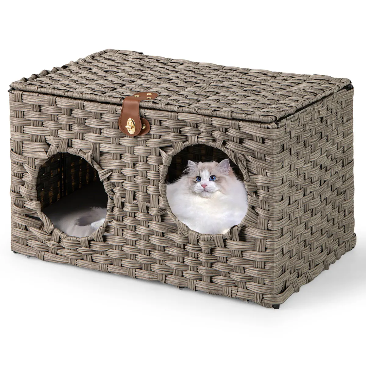 Grey woven cat hideaway on a white background with a fluffy white cat looking out of one entrance