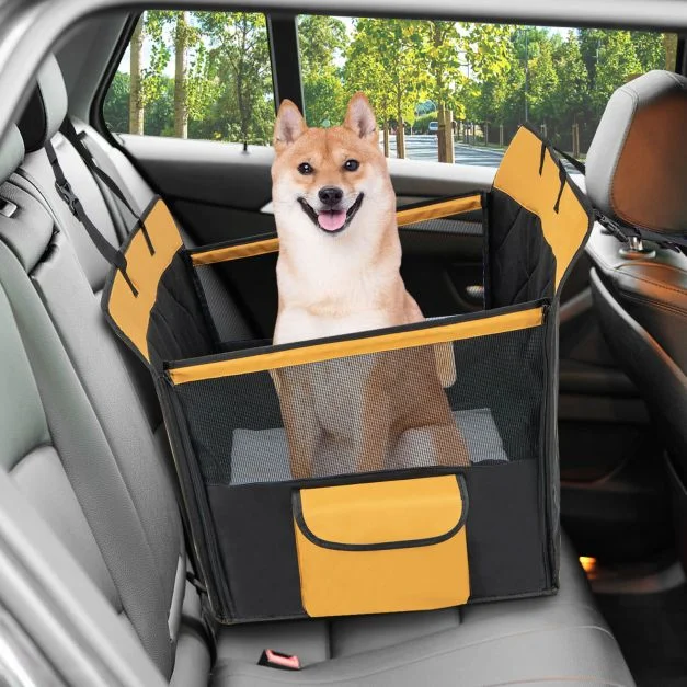 Black and yellow dog car-seat cover fitted in a vehicle