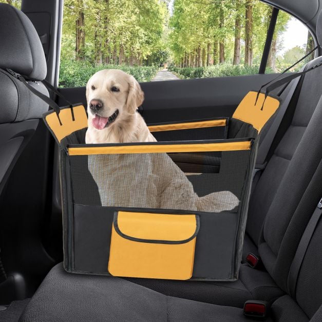 Black dog car-seat cover with yellow trim and storage pocket
